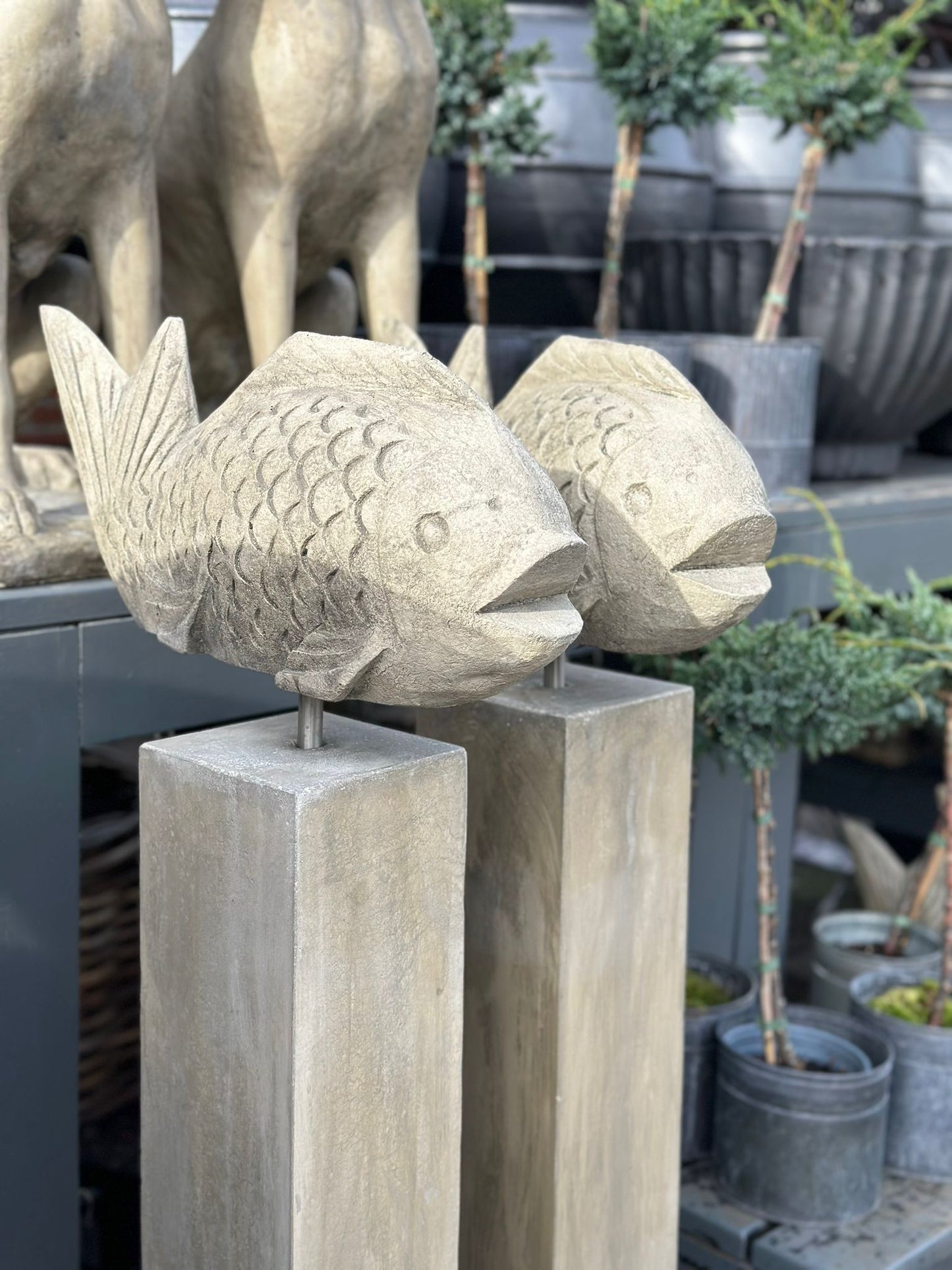 Fisch Wanda auf Stele