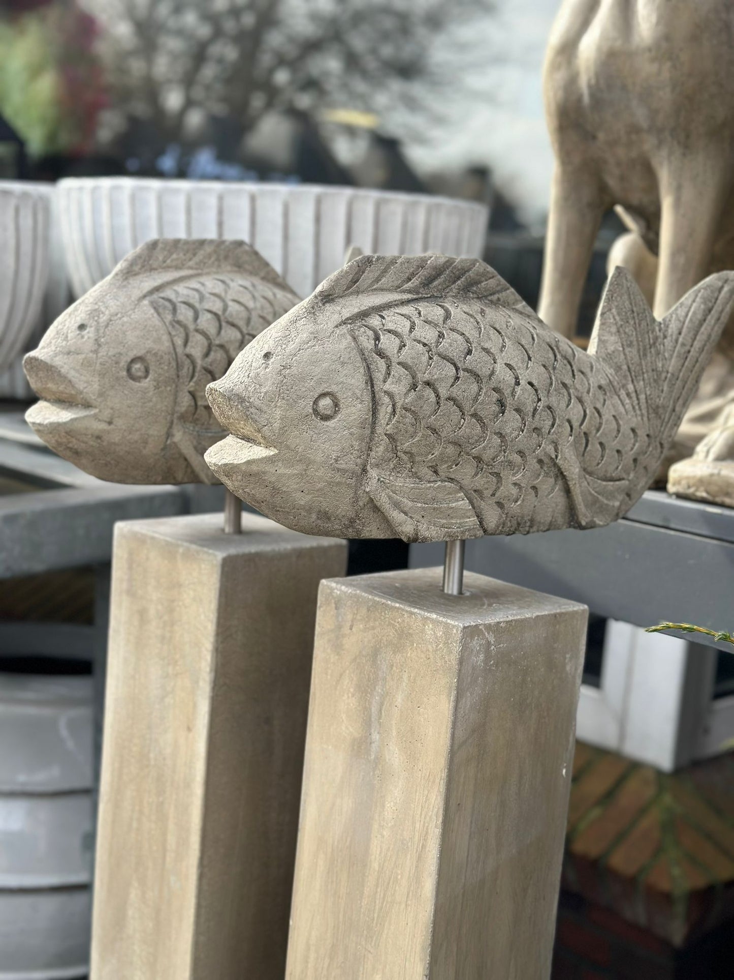 Fisch Wanda auf Stele