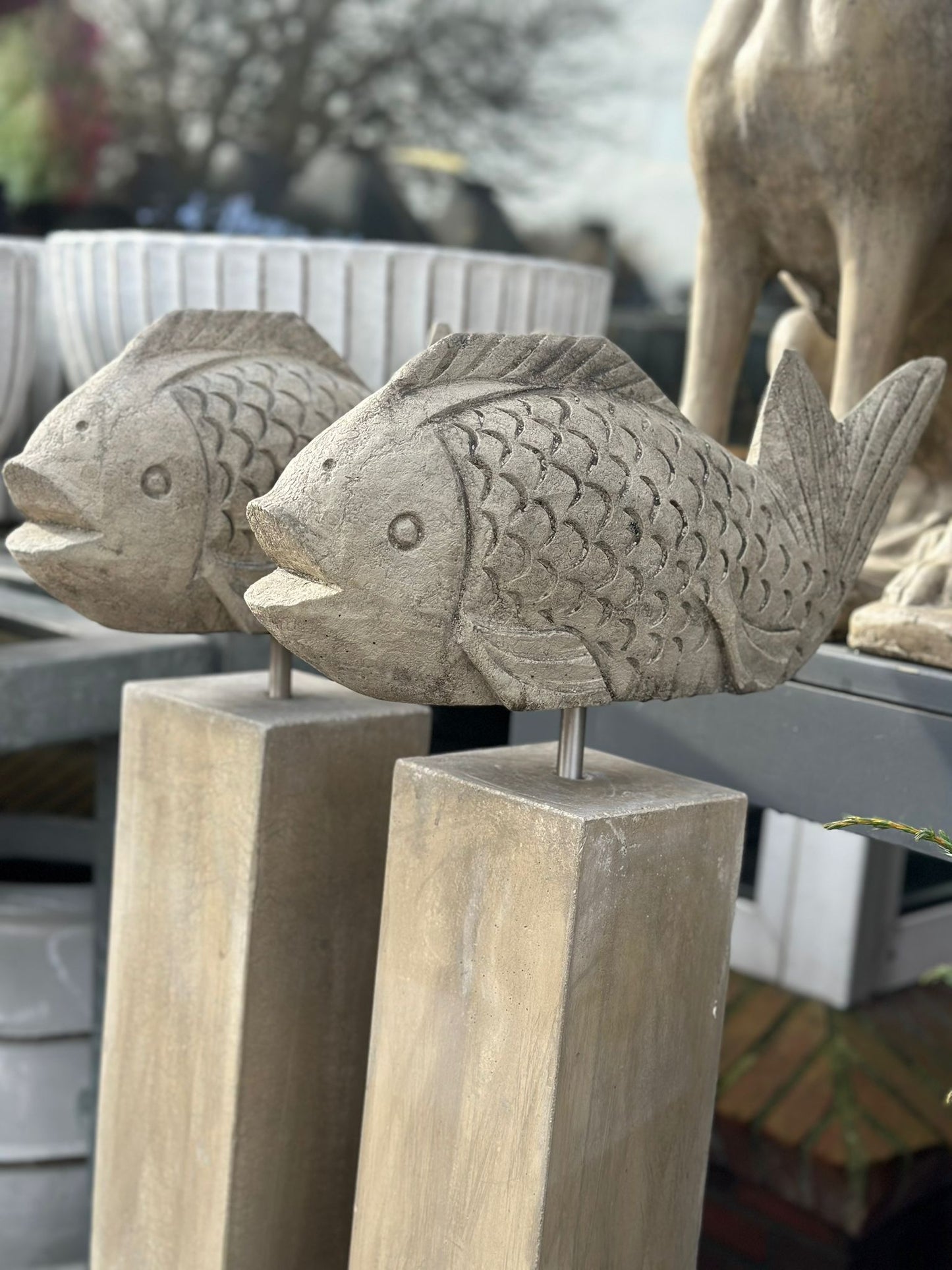 Fisch Wanda auf Stele