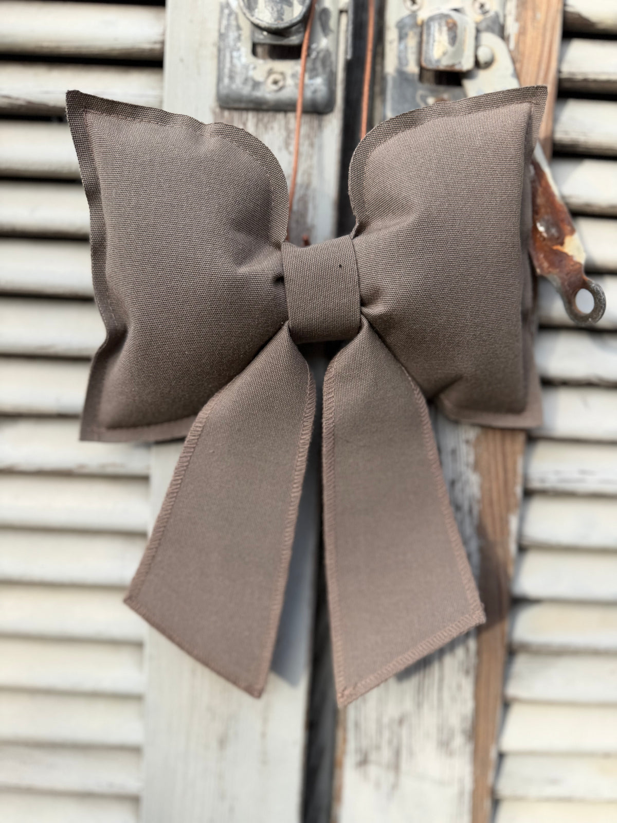 Schleife aus Canvas von Stjernefabrikken in Taupe