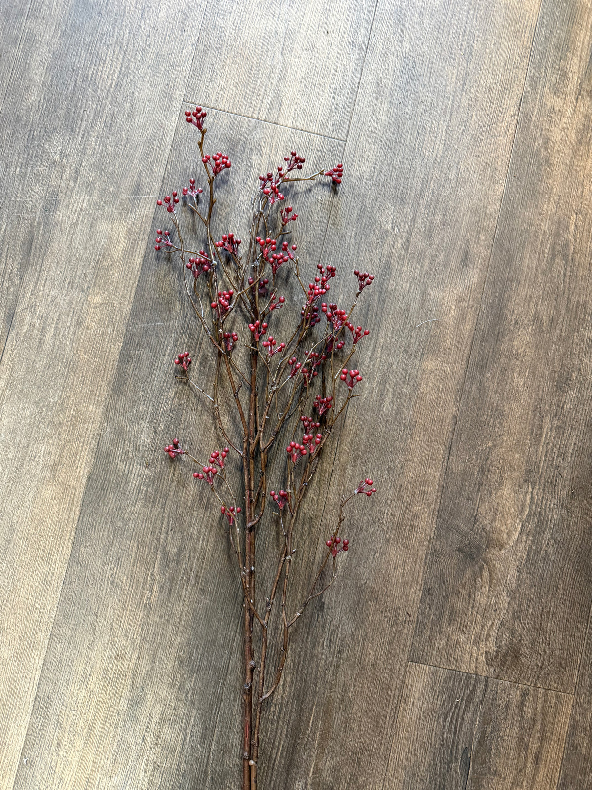 Kunstblume Hagebuttenzweig