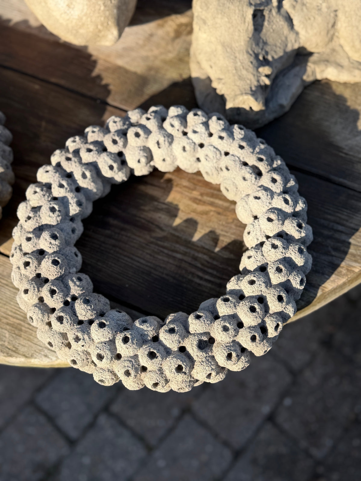 Gartenkunst Kranz aus Beton